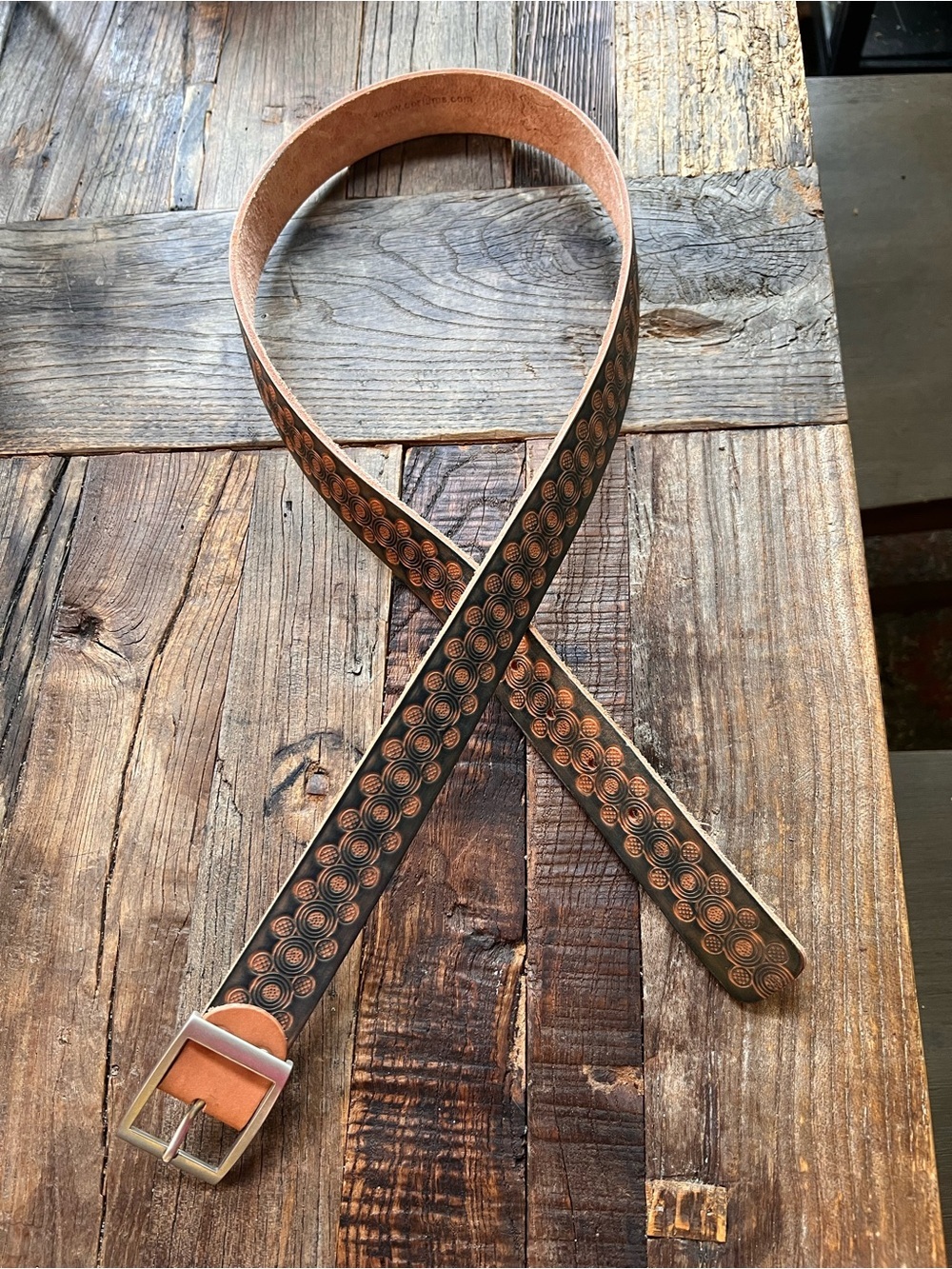 Two toned stamped leather belt with silver buckle